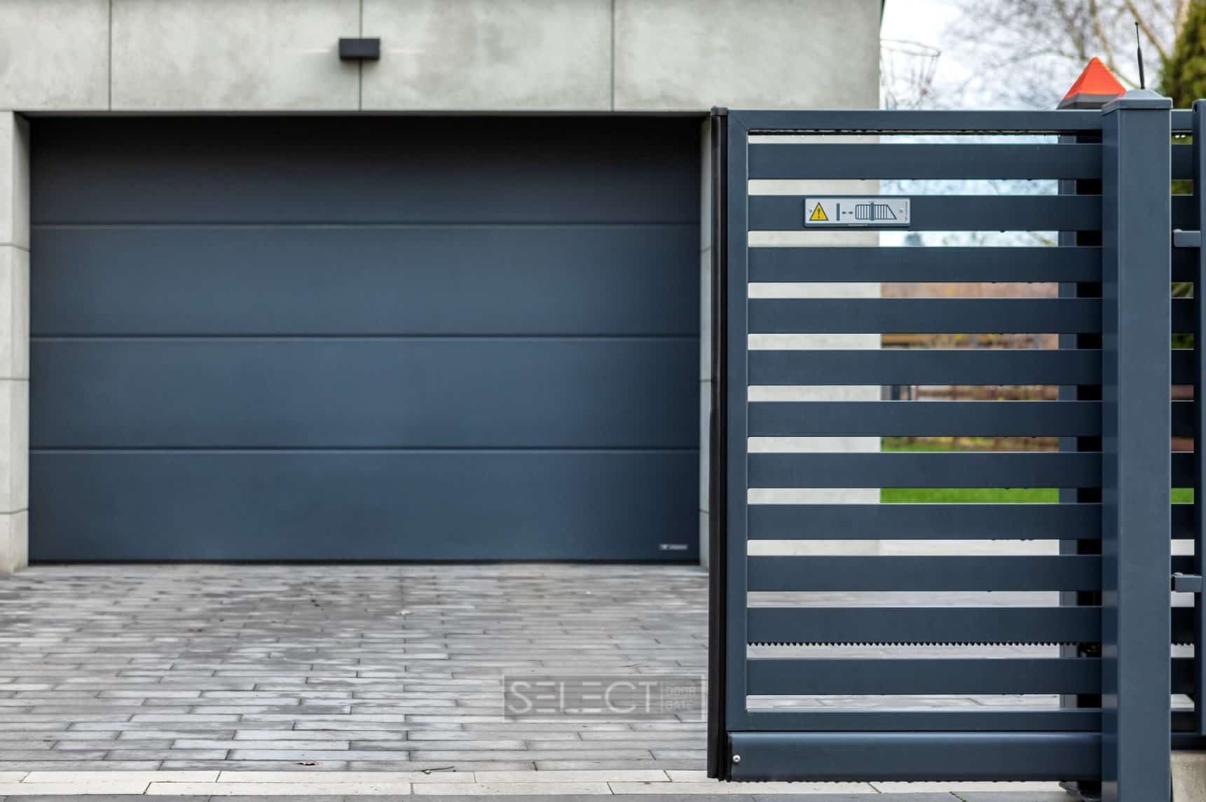 секционные гаражные ворота - теплые энергоэффективные конструкции для паркоместа